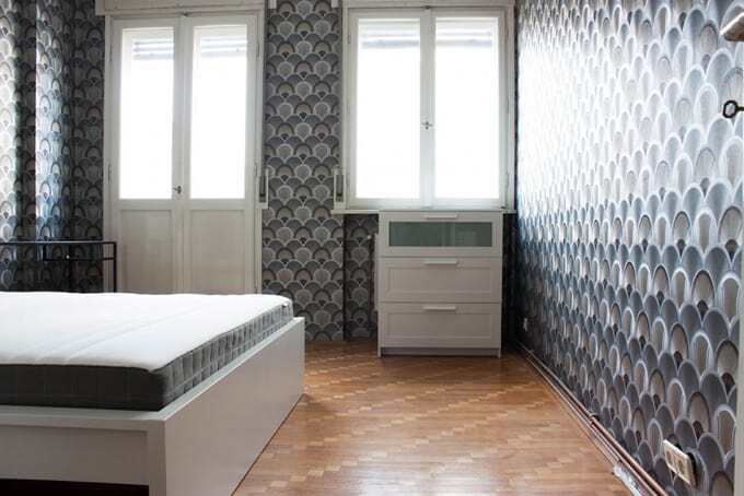 bedroom with grey wallpaper